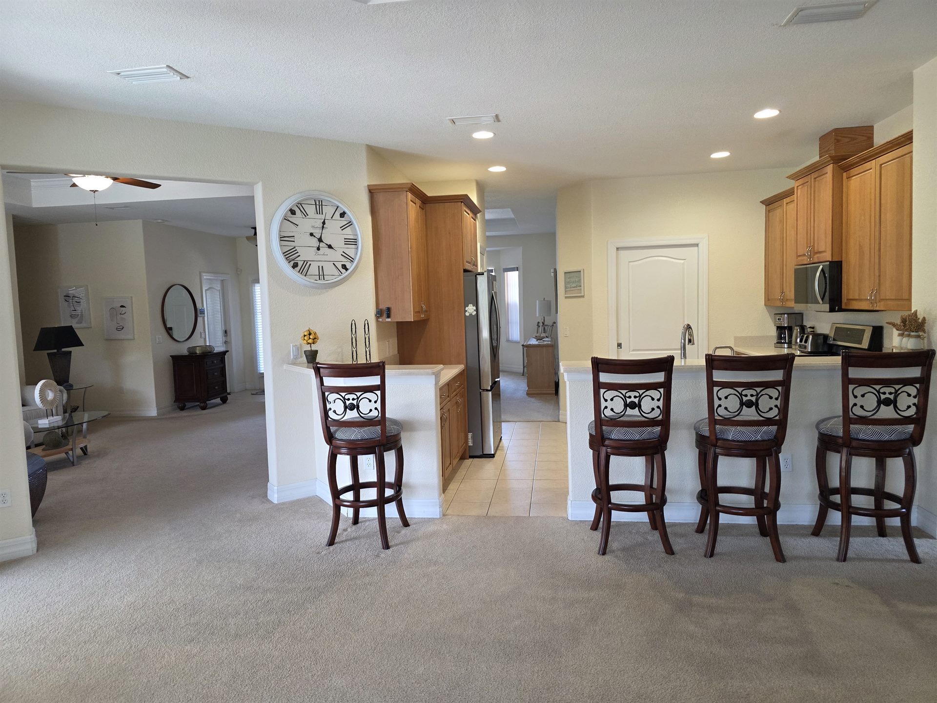 Kitchen and breakfast bar from living area