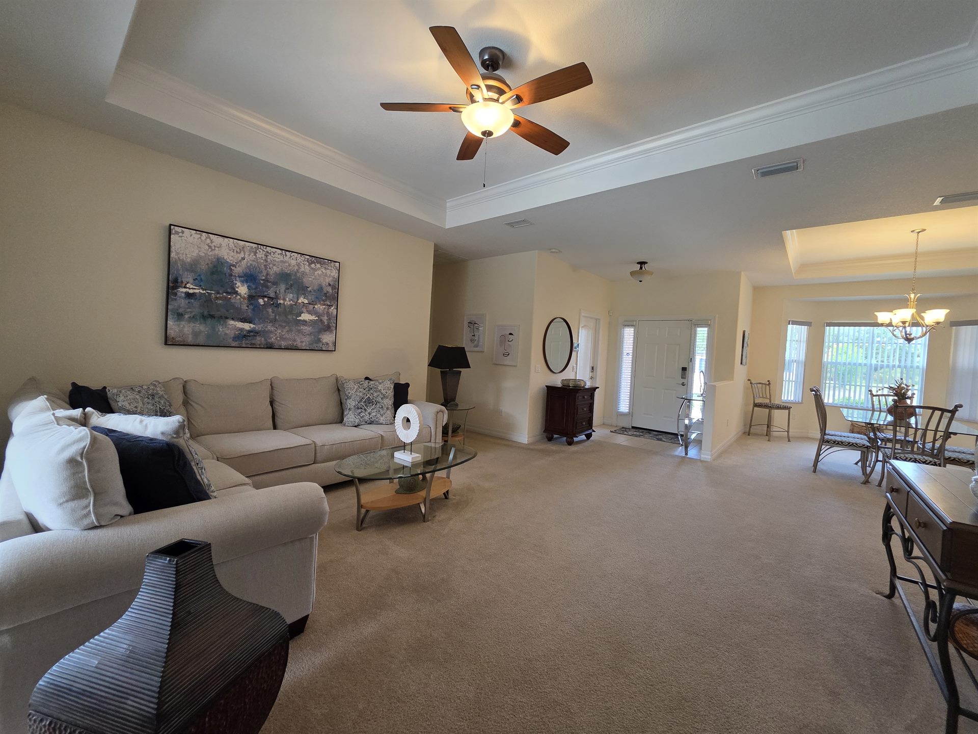 Wide living room and dining room view